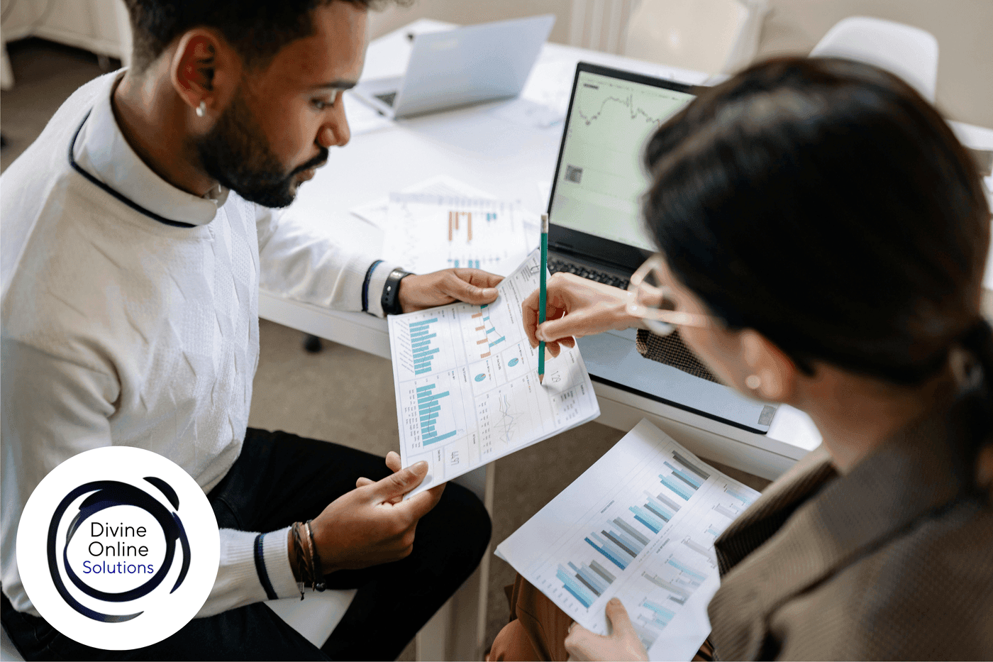 Business owner reviewing IT performance dashboards and ROI metrics with a technology strategist